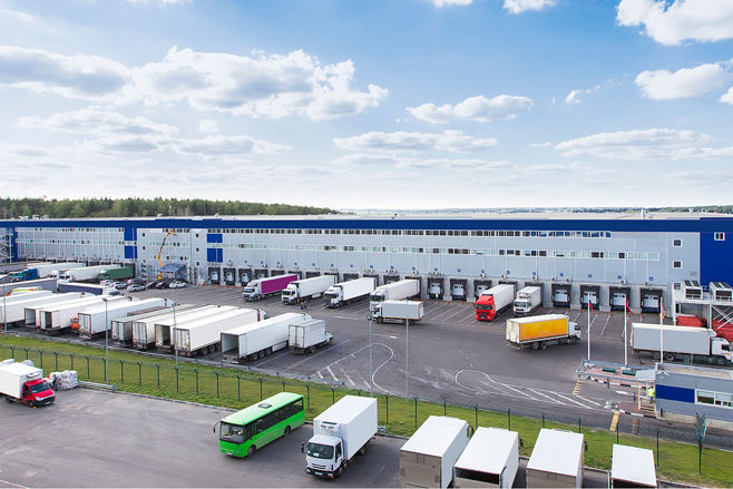 shipping trucks at warehouses