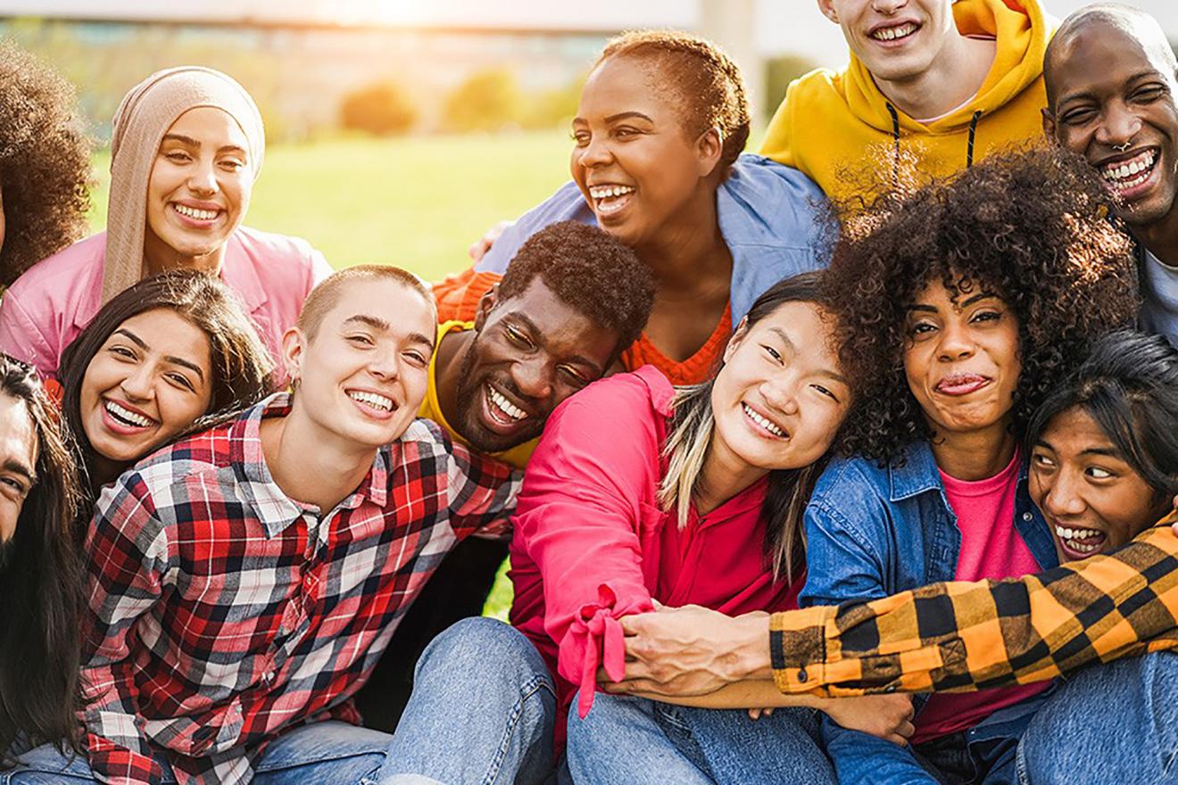 A group of young people pose for the camera in a friendly attitude. 