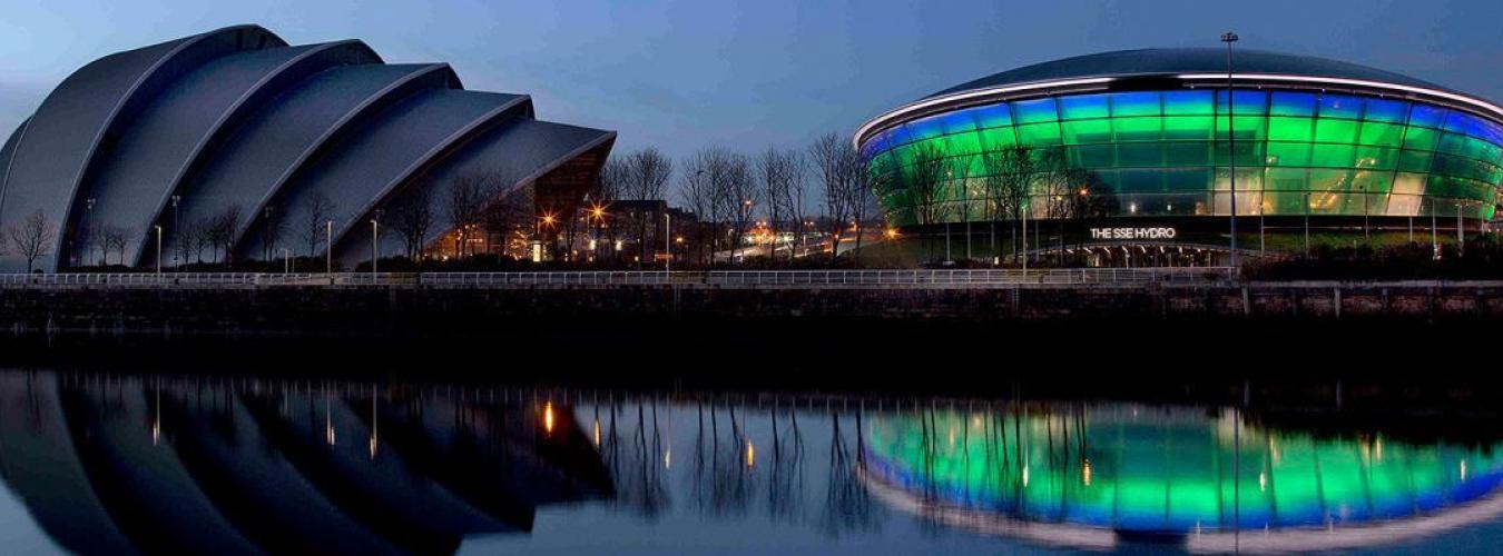 Conference building with green lights at night