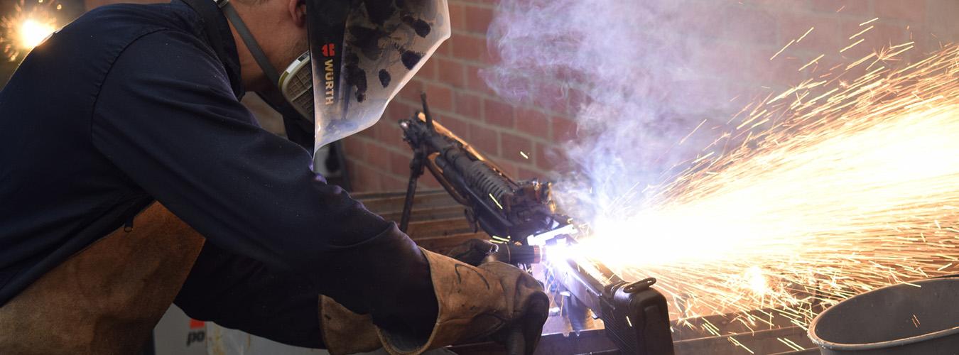  a man destroying a rifle