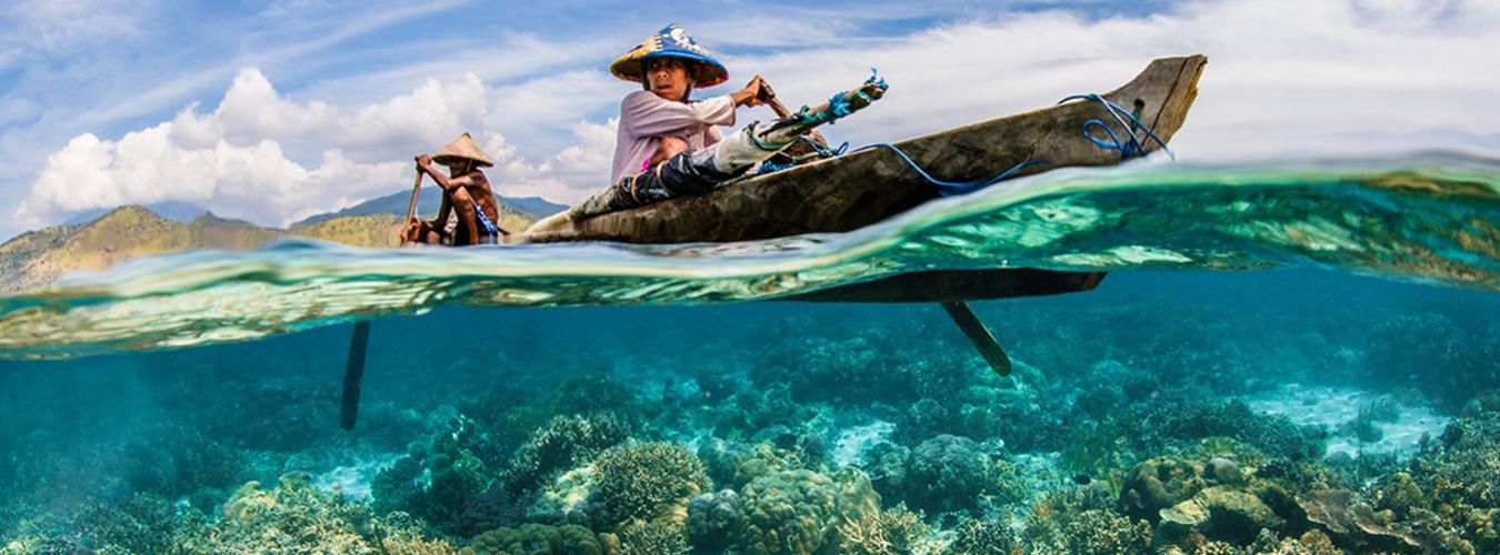 Fisherman in canoe