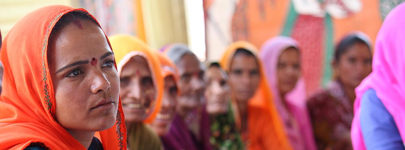 A village council head attends a meeting to develop her leadership skills