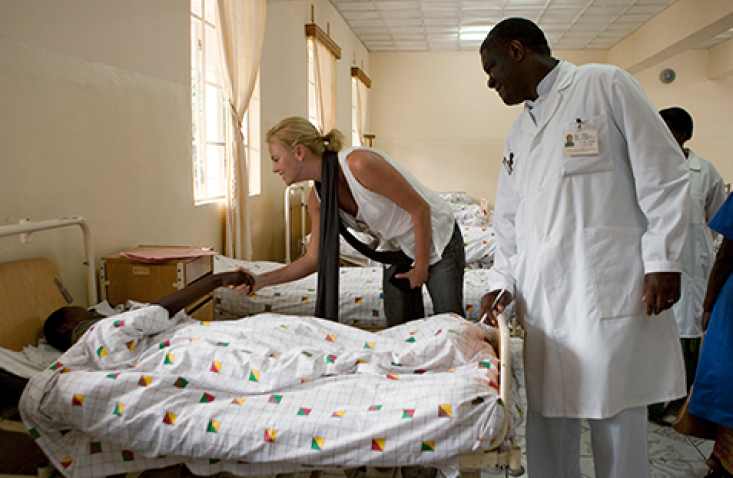 Charlize Theron with one of the patients in Panzi Hospital in Bukavu, Democratic Republic of the Congo. The hospital specializes in treating victims of sexual violence against women. UN Photo/Marie Frechon