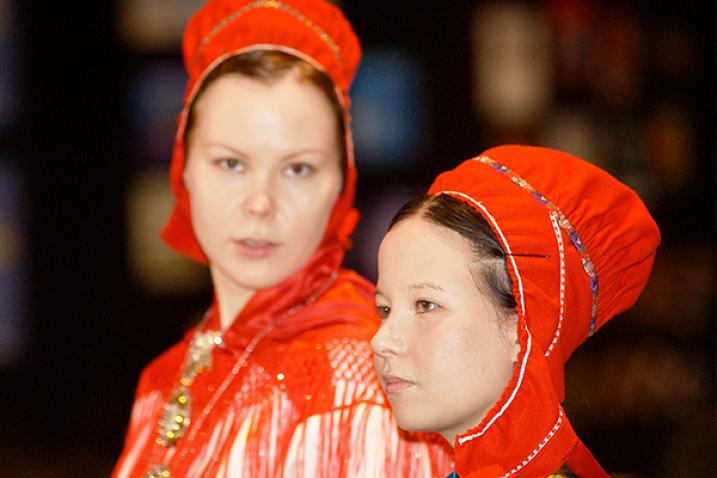 Two young women dressed in cultural attire.