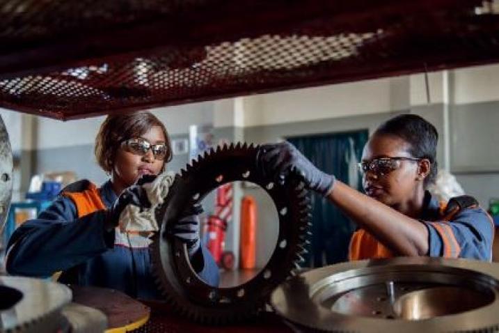 Two women working at an engineering company, link to African Economic Conference.