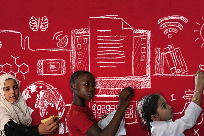 Children drawing on a board