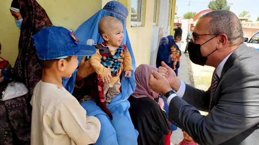 Ramiz greets Afghan women and childrren