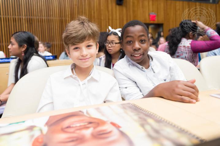 Children pose during a special event on Universal Children's Day.