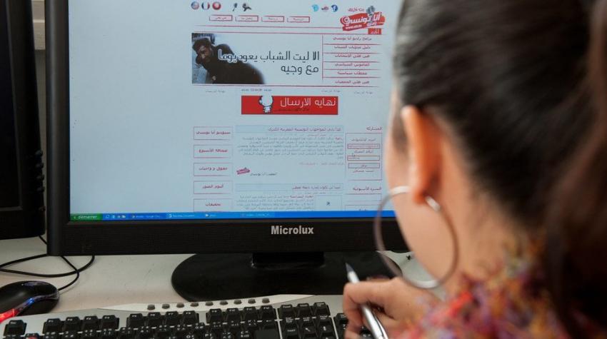 World Bank/Arne Hoel. A young woman works on a computer in Tunisia