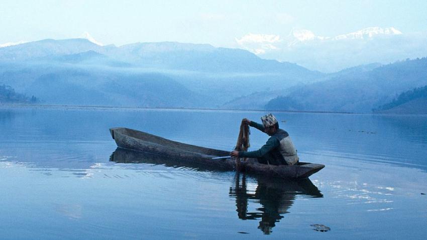 UN Photo/Ray. Witlin A man fishes on Lake Fewa in Nepal