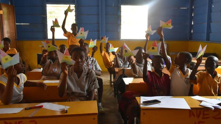 UN Ghana. Pupils in Accra hold origami hummingbirds, as part of the World Water Day 2023 campaign.