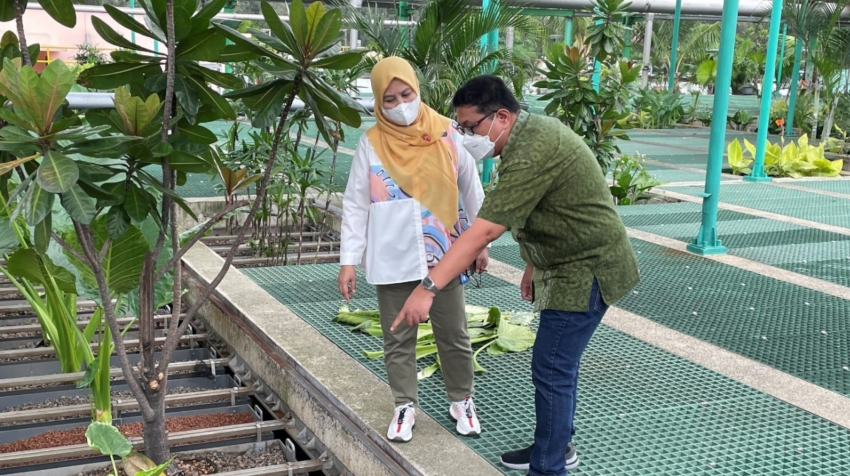 Gaspar/UNIC Jakarta: Susi Rahmawati, Manager of Customer Service and Legal Affairs, surveying the wastewater treatment plant at MM 2100 Industrial Town, one of Indonesia’s eco-industrial parks