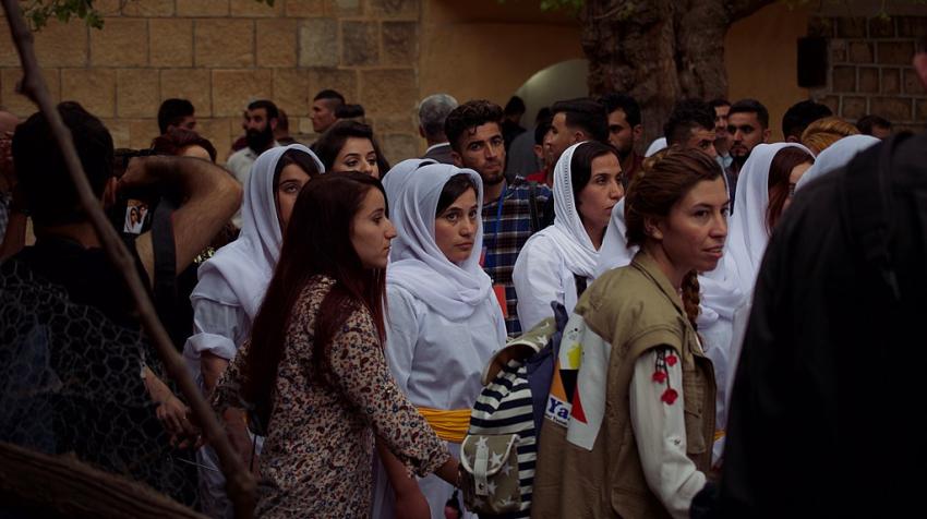 Pilgrims at a festival at Lalish in Dohuk Governorate, Kurdistan region of Iraq, on the day of the Yazidi New Year, 18 April 2017.  Levi Clancy, CC BY-SA 4.0, via Wikimedia Commons