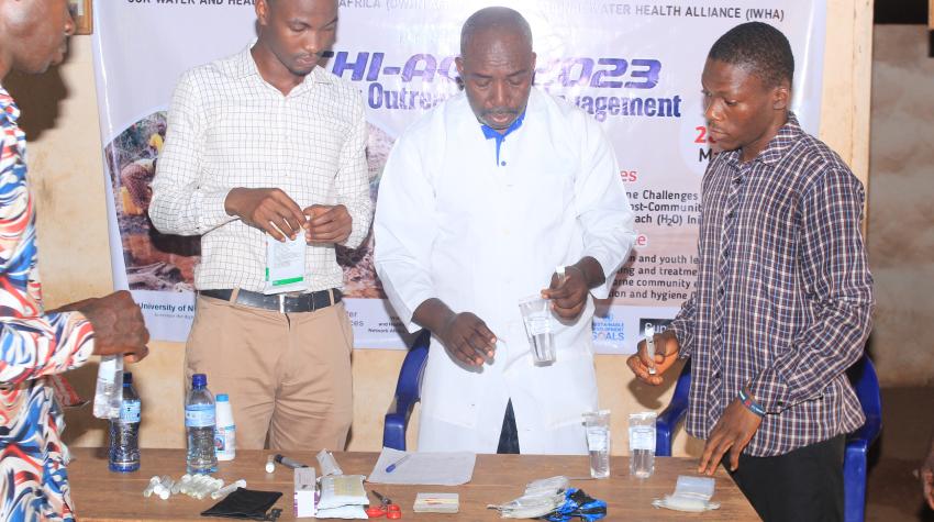 Adults and young people were given hands-on training on testing and treating their water (Photo: UNN)