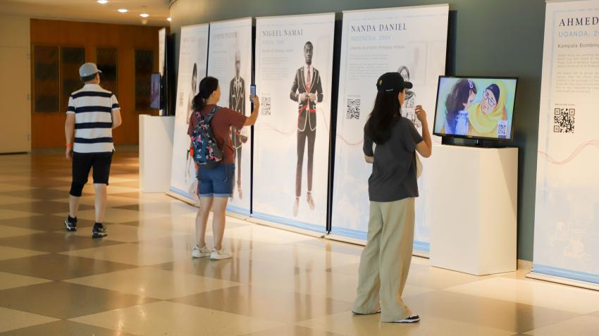 The "Memories" exhibition displayed in the Visitor’s Lobby of the United Nations Secretariat Building, August 2023. United Nations Office on Counter-Terrorism Office
