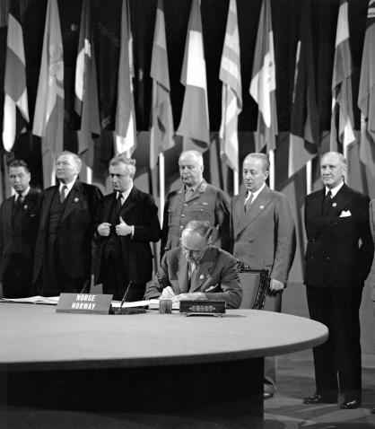 Wilhelm Munthe Morgenstierne, Ambassador to the United States, member of the delegation from Norway, signing the Charter of the United Nations at the Veterans' War Memorial Building in San Francisco, United States on 26 June 1945.UN Photo/McLain 