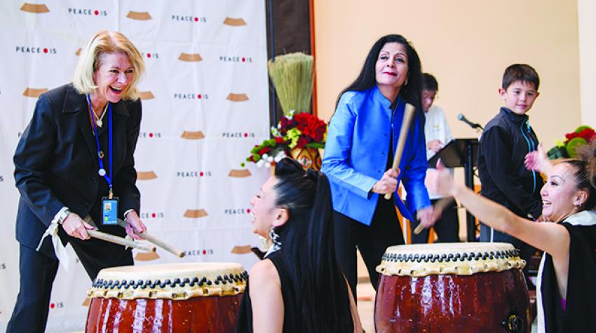 Performance by the New York-based group Cobu, whose motto, “Dance Like Drumming, Drum Like Dancing”.  Alison Smale (left) takes part in the event. 13 November 2017. © UN Photo/Manuel Elias