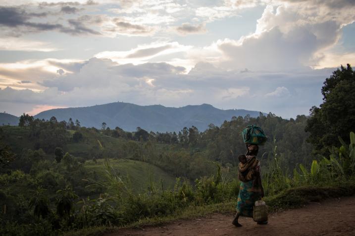 Brandau A woman, carrying her child, walks back to her home from the fields in DR Congo’s North Kivu province. The situation in the region remains highly volatile, with civilians bearing the brunt of armed group violence.