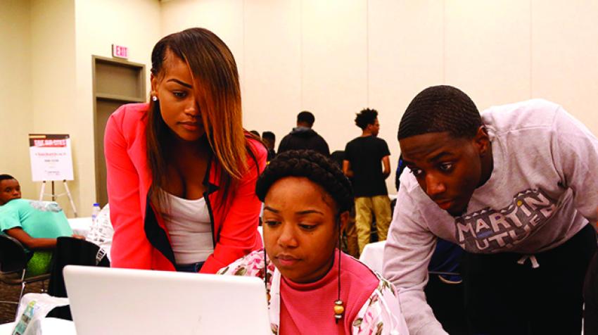 Competitors in the National Urban League’s annual Hackathon work to develop digital solutions to social justice challenges.  © national urban league