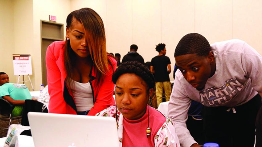  Competitors in the National Urban League’s annual Hackathon work to develop digital solutions to social justice challenges.  © national urban league