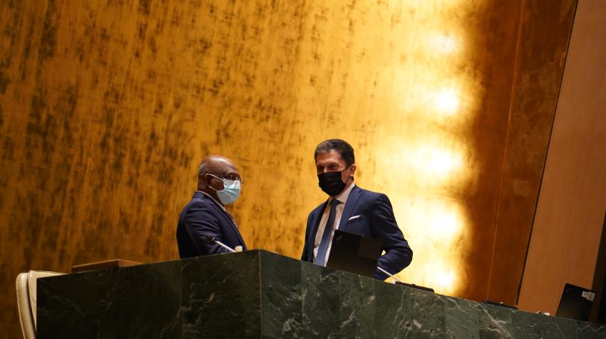 Under-Secretary-General Movses Abelian speaking with the President of the 76th session of the General Assembly, Abdulla Shahid, in the General Assembly Hall. Photo credit: UN DGACM