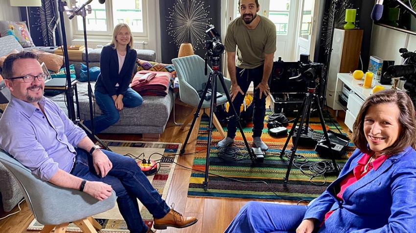 A group photo of the team working on the interview. Neil Walsh and Melissa Fleming are at the front of the photo.