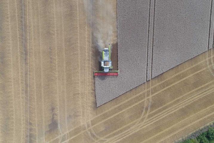 Drone shot of combine harvester, United Kingdom