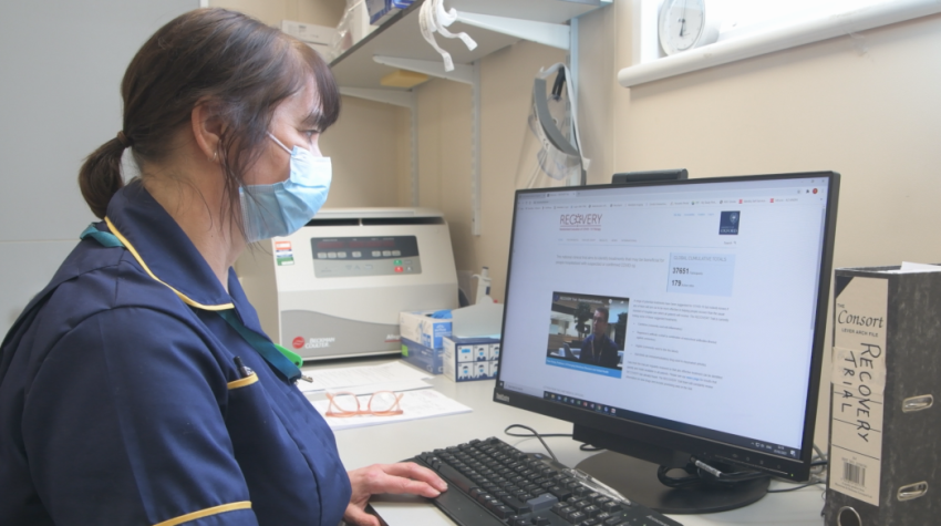 A nurse looks at the RECOVERY trial website (Photo: Cambridge University Hospitals)