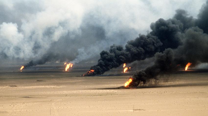 Oil well fires rage outside Kuwait City in the aftermath of the 1990-91 Gulf War. 21 March 1991. David McLeod, Public domain via Wikimedia Commons