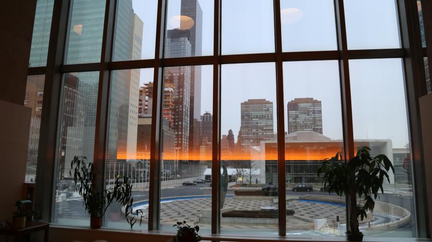 Huge windows in the reading room, facing outside the Secretariat Building where the ornamental pool is located. 