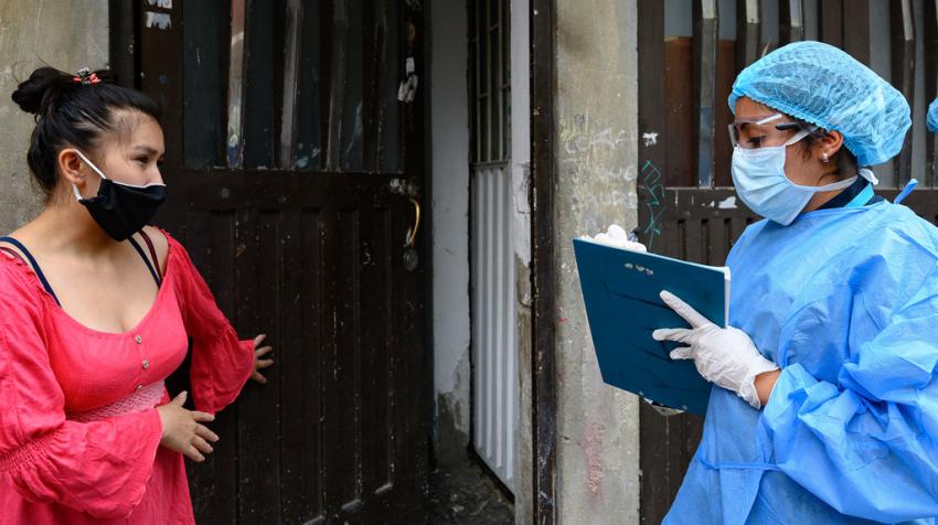 health worker educating public