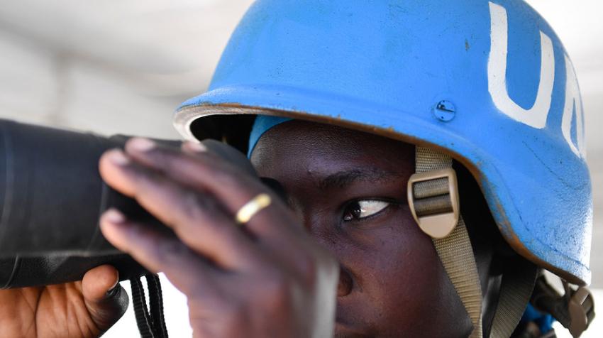 A female Ugandan soldier serving under the UN Guard Unit scans the horizon while on duty in Somalia (Photo:UN Photo/Ilyas Ahmed) 