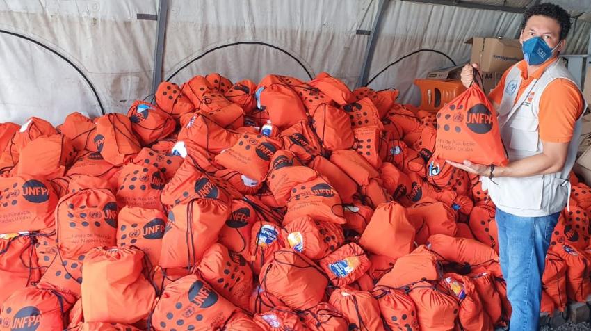 Rafael Sanz, a migrant from Venezuela, delivers dignity kits containing personal hygiene items to protect against spreading COVID-19 to migrants and refugees in Brazil.