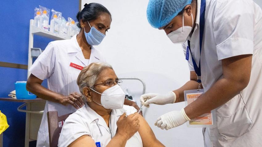 Doctors and health workers are the first to receive the COVID vaccination in India.