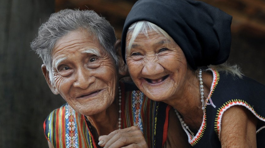 Two older women smiling 
