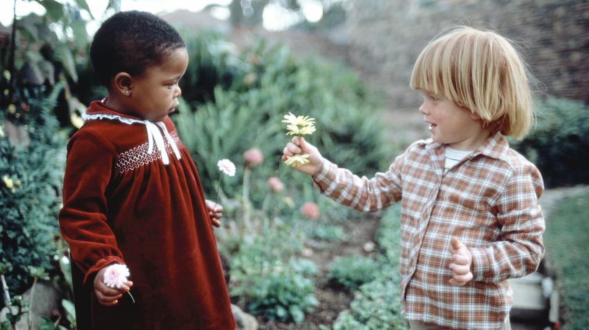 During apartheid in South Africa, when black people were denied their basic human and political rights, two youngsters of different races forge a connection in Cape Town. UN Photo (1982)