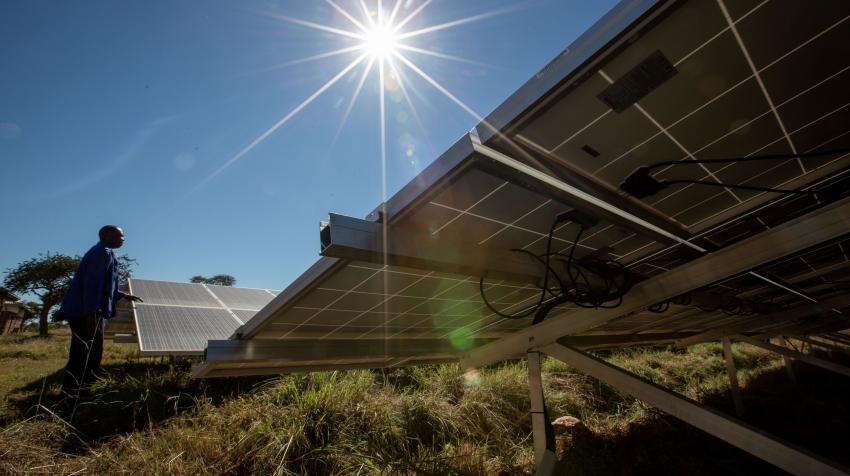 A hospital electrician ensures maintenance of the solar panels at the Nkayi District Hospital, Bulawayo, Zimbabwe. UNDP/Slingshot