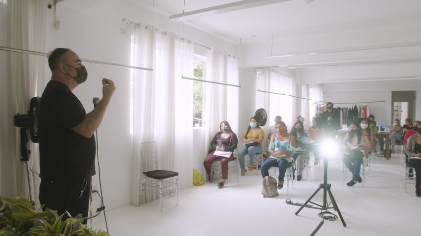 Fashion designer Reinaldo Lourenço addresses workshop participants in his factory in São Paulo, Brazil. Photo courtesy OIT/MPT/UNICAMP