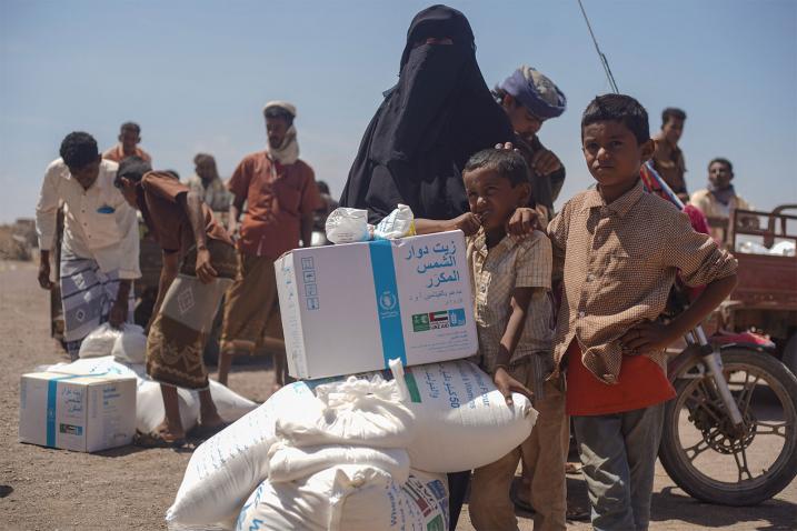 family receiving WFP food aid