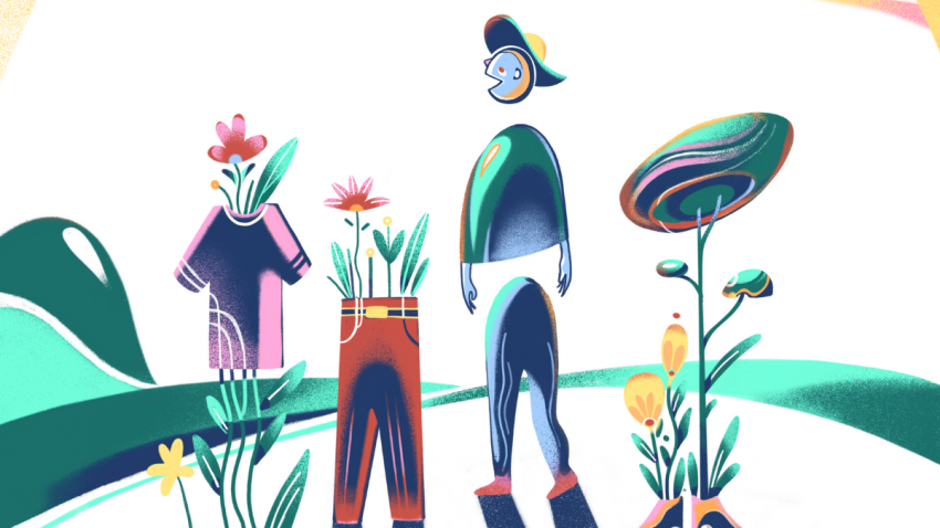 A person surrounded by plants