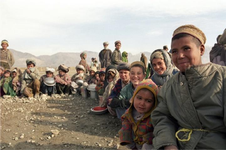 Group photo of displaced people in Afghanistan.