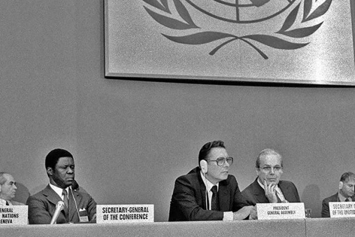 Participants at the podium facing the audience.