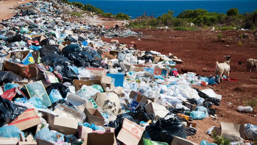 Mountain of rubbish and garbage on the beach by the sea