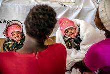 Mothers wait with their babies to be attended by a midwife at Ntimaru Sub County Level 4 Hospital in Kehancha, Migori County, Kenya, 8 June 2022. UNFPA