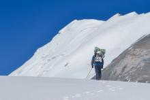 Worker installing stakes on one of the key benchmark glaciers of Rikha Samba Glacier Mustang, Nepal. The International Centre for Integrated Mountain Development (ICIMOD) has been doing this annually for 13 years. Photo: Tenzig Chogyal Sherpa