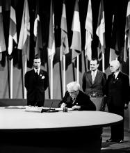 Joseph Paul-Boncour, former Prime Minister and member of the delegation from France, signing the UN Charter  at the Veterans' War Memorial Building, San Francisco, United States, 26 June 1945.UN Photo/McCreary 