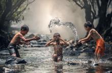Boys playing in a stream, 6 March 2016. Photo by Sasin Tipchai from Pixabay. 