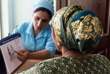 A nurse counsels a patient on viral load suppression at the City AIDS Center in Dushanbe, Tajikistan. Photo credit: Hugh Siegel/ICAP. March 2018