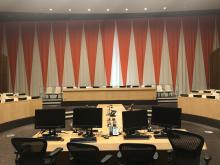 Further zoomed in view of the ECOSOC chamber with a seating area in the middle of the chamber. 