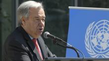 Secretary-General António Guterres speaking at a podium